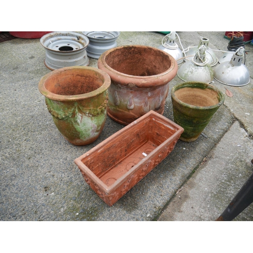 91 - 4 TERRACOTTA PLANTERS