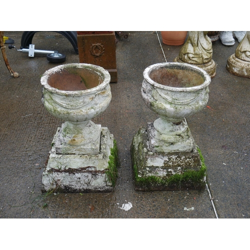 134 - PAIR OF CONCRETE PLANTERS