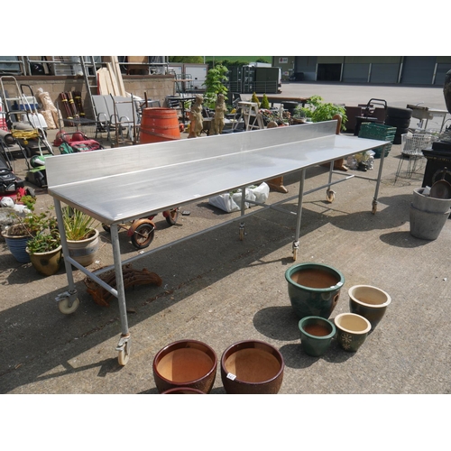 128 - STAINLESS STEEL TROLLEY TABLE - APPROX 12' LONG