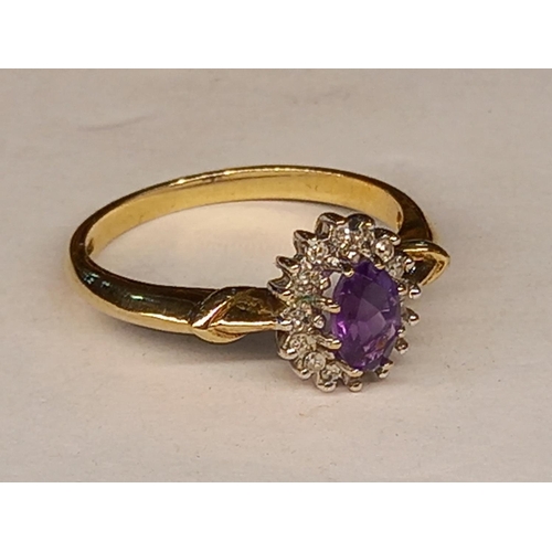 393 - 9CT AMETHYST & DIAMOND RING SIZE N.1/2