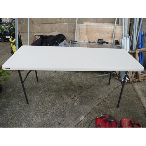 67 - PLASTIC FOLDING TABLE