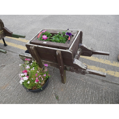 91 - WHEELBARROW PLANTER & 1 HANGING BASKET