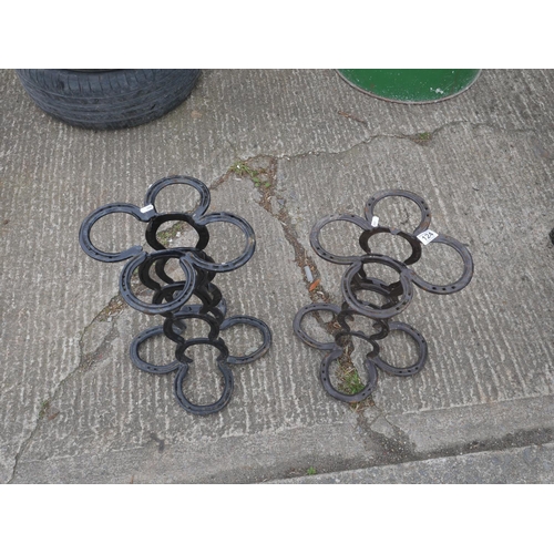 124 - 2 HORSE SHOE PLANT STANDS