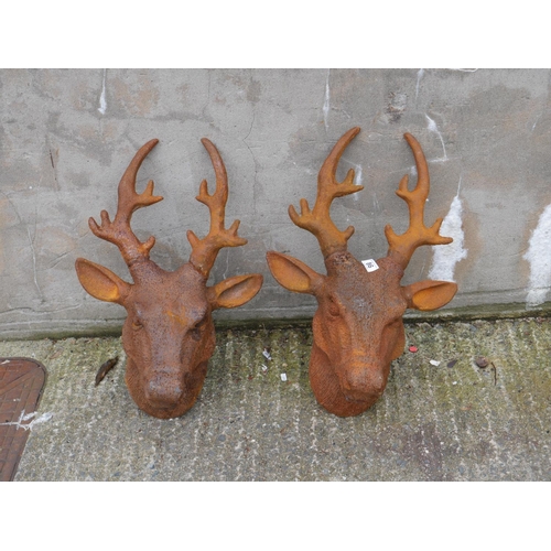 86 - PAIR OF CAST IRON STAG ORNAMENTS