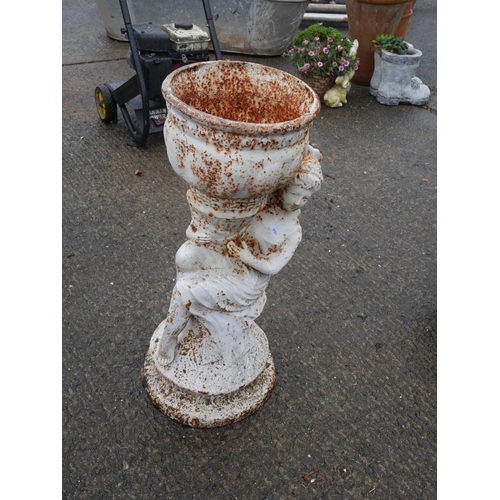 104 - CAST IRON FIGURINE PLANTER