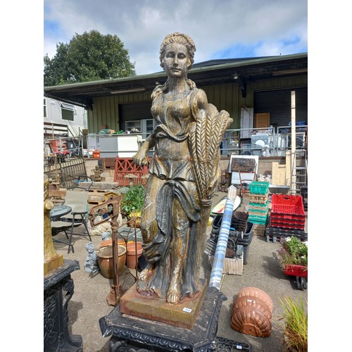 147 - CAST IRON FOUR SEASONS FIGURES ON CAST IRON PLINTHS - APPROX 7 FT TALL