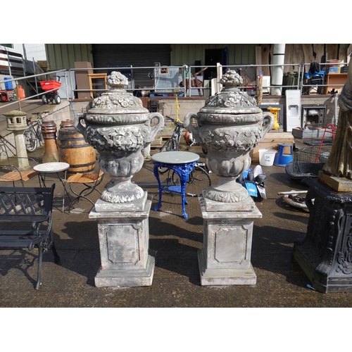 135 - 2 CONCRETE URNS ON BASES