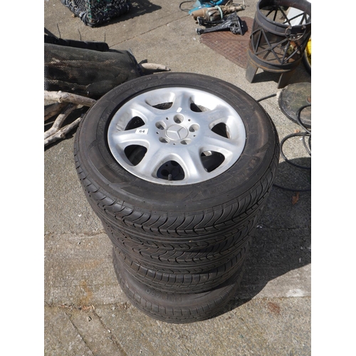 64 - 4 ALLOY WHEELS