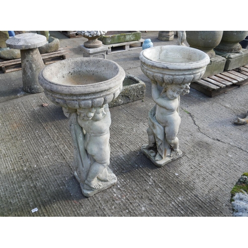 108 - PAIR OF CONCRETE PLANTERS