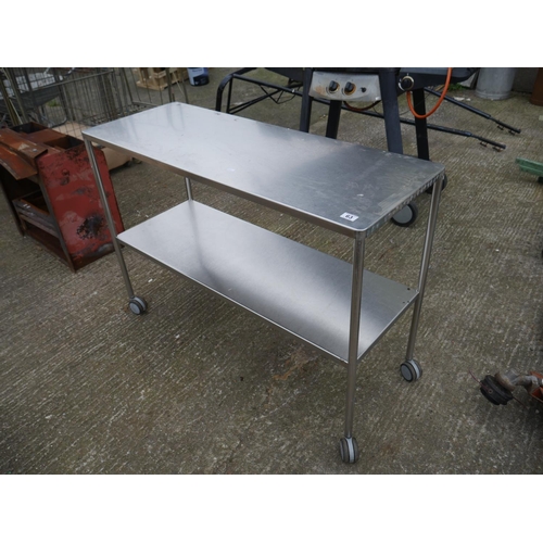 63 - STAINLESS STEEL TABLE ON WHEELS