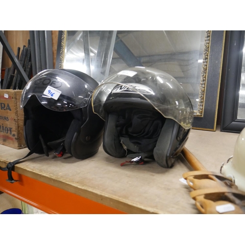 916 - 2 HELMETS