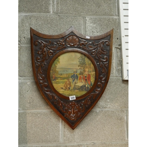 308 - 19TH C. OAK CARVED SHIELD WITH MILITARY PRINT INSET