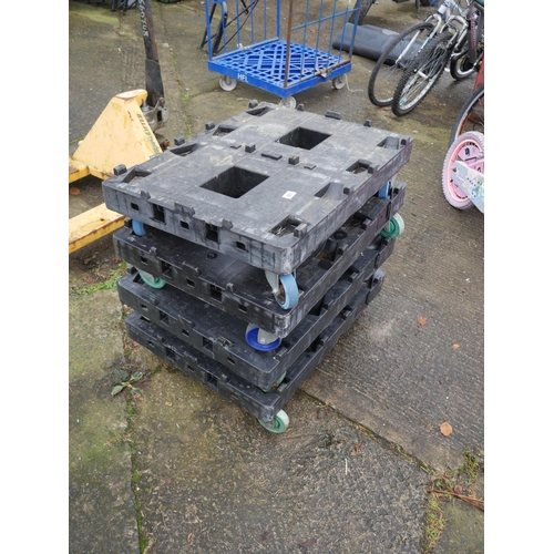 61 - 4 PLASTIC TROLLEYS