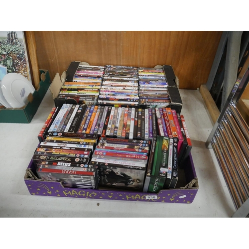 838 - 2 BOXES OF DVDS