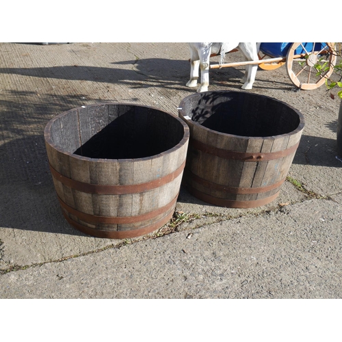 126 - PAIR OF HALF BARREL PLANTERS