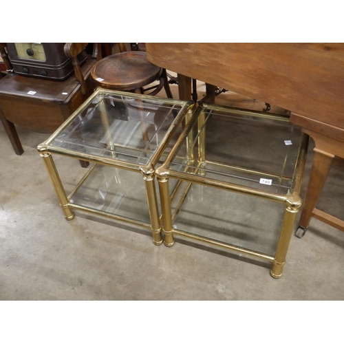 749 - 2 GLASS TOP TABLES