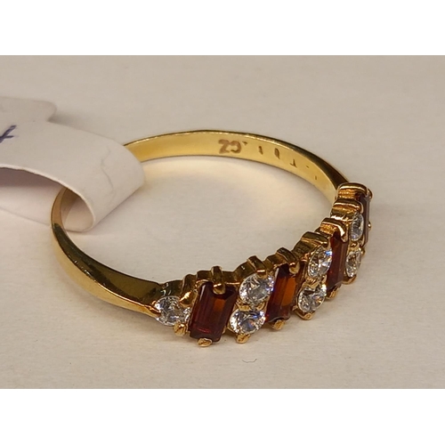 319 - 9CT GARNET & CZ RING SIZE Q.1/2