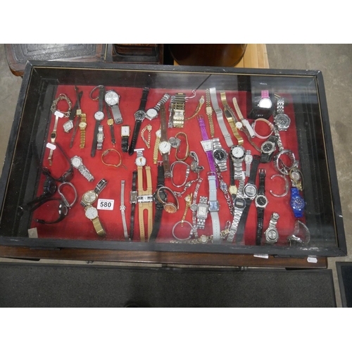 580 - DISPLAY CASE AND WATCHES