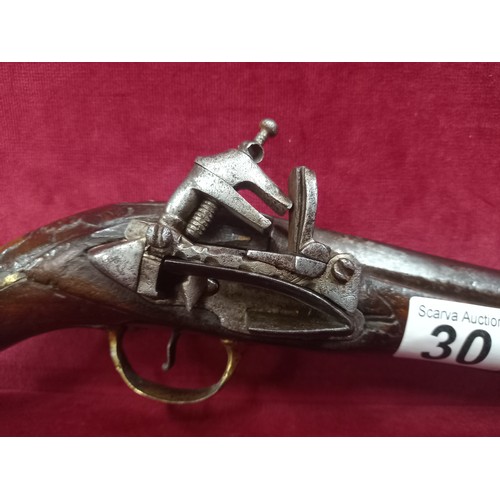 30 - FLINTLOCK PISTOL MECHANISM WORN TOTAL LENGTH 17 1/2 INCHES