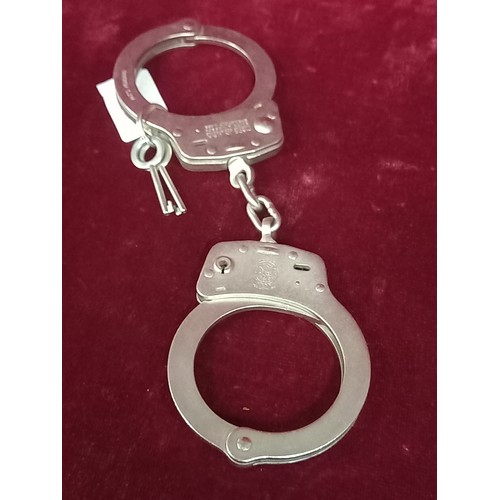 37 - SET OF HAND CUFFS