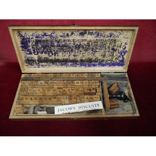 185 - BOX OF WOODEN STAMPS