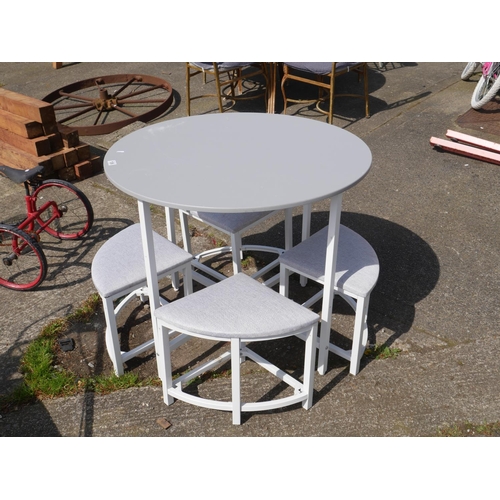 106 - TABLE AND 4 STOOLS
