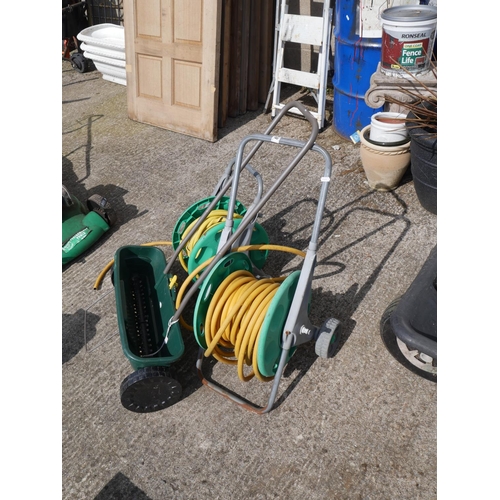83 - 2 GARDEN HOSES AND SOWER