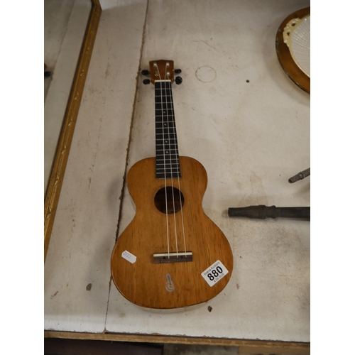 880 - TOY GUITAR