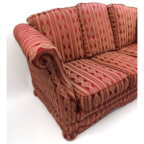 23A - Dellbrook three seater settee with red and gold striped upholstery, approximately 200cm long