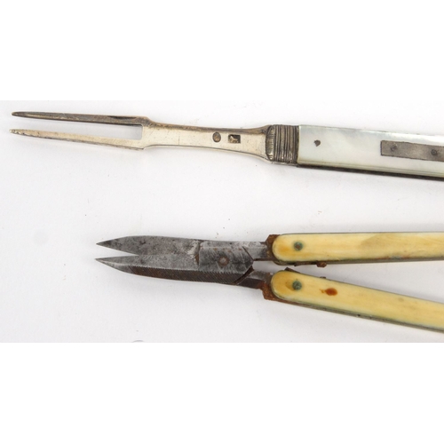 118 - Victorian silver bladed pocket fork, silver propelling pencil and a folding pair of scissors, the la... 