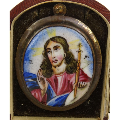 69 - Enamelled icon housed in a red leather case, the icon 5.5cm high including the mount