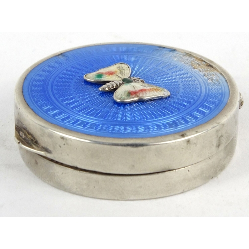 41 - Circular silver blue guilloche enamel pill box with butterfly to the lid, Jieves Ltd, Birmingham 192... 