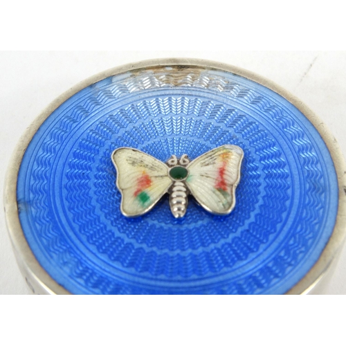 41 - Circular silver blue guilloche enamel pill box with butterfly to the lid, Jieves Ltd, Birmingham 192... 