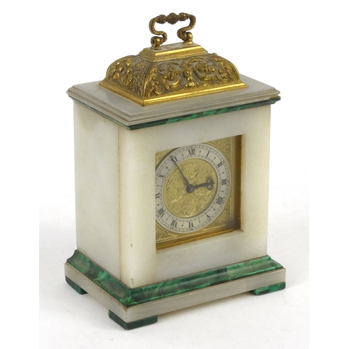 1114 - White marble malachite and brass mantel clock with swing handle, 14cm high excluding the handle
