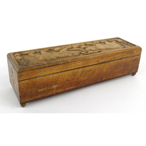 3 - Black Forest wooden glove box carved with bears and lined with a  green buttoned silk interior, 35cm... 