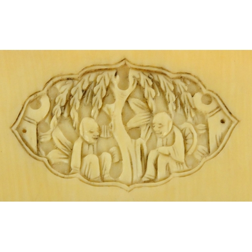 588 - Oriental Chinese ivory card case carved with panels of figures, 11cm x 17cm