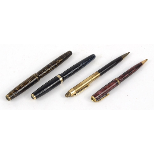 103 - Two Parker striped fountain pens ,two Parker striped ballpoint pens and an Eversharp example, the la... 