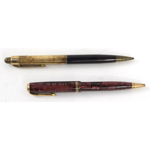 103 - Two Parker striped fountain pens ,two Parker striped ballpoint pens and an Eversharp example, the la... 