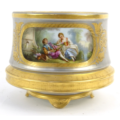 717 - 19th Century Continental porcelain jardinière hand painted and gilded with a panel of lovers and flo... 