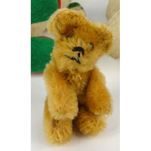 541 - Two miniature jointed teddy bears and two Peter Rabbit soft toys and felt mouse with paper label, th... 