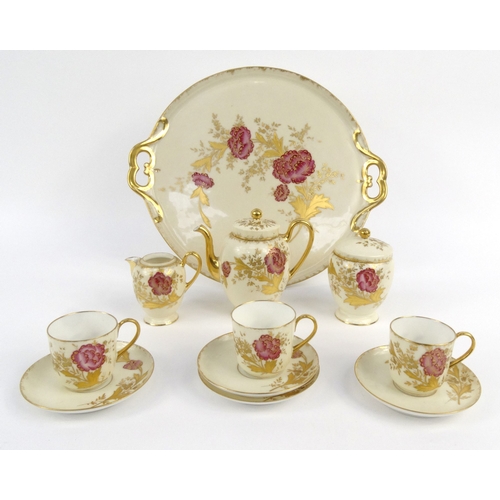 724 - Limoges porcelain cabaret set hand painted and gilded with flowers, Limoges marks to base, the tray ... 