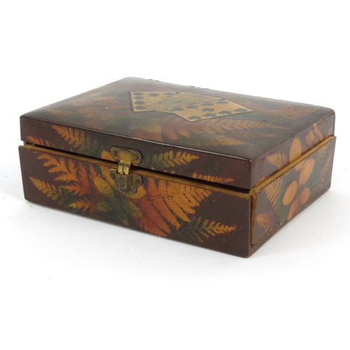 55 - Victorian fern work wooden card box with a selection of playing cards, 15cm diameter