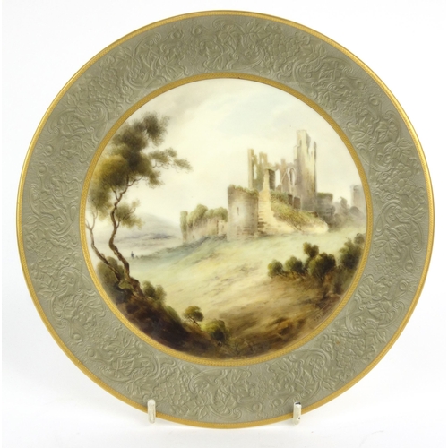 680 - Royal Worcester porcelain plate hand painted with a Caerphilly castle scene by Johnson, impressed ma... 
