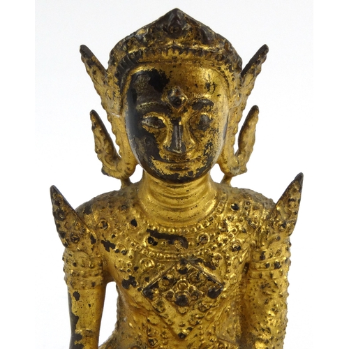 574 - Oriental Chinese gilt bronze Buddha, 16cm high