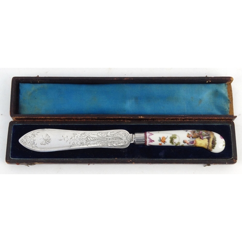 721 - Victorian Continental porcelain handled butter knife hand painted with lovers, London 1872-73, in a ... 