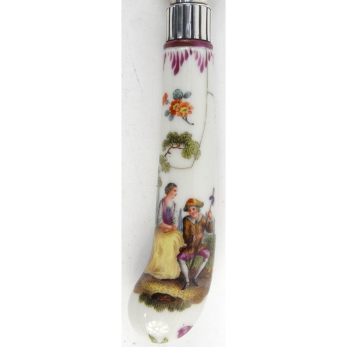 721 - Victorian Continental porcelain handled butter knife hand painted with lovers, London 1872-73, in a ... 