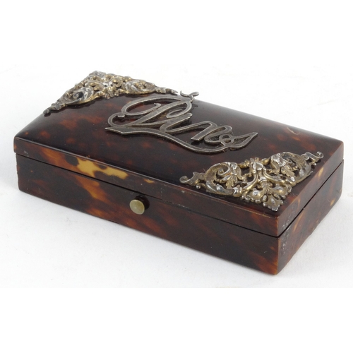 83 - Tortoiseshell pin box with pierced floral silver mounts, 10cm diameter