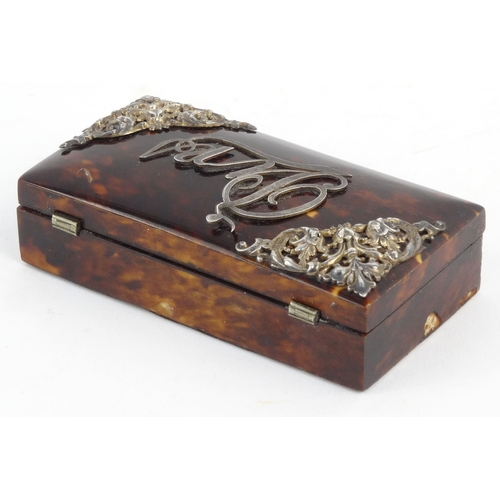 83 - Tortoiseshell pin box with pierced floral silver mounts, 10cm diameter