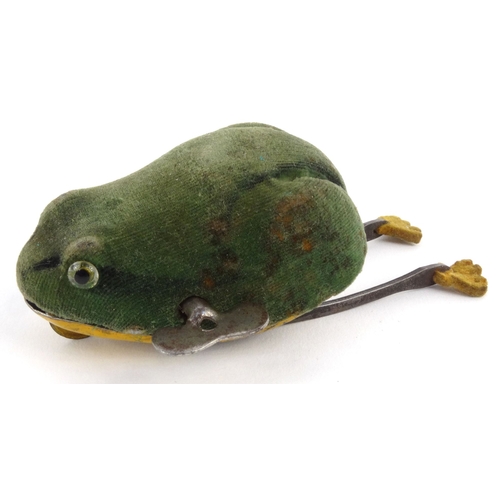 561 - Schuco tinplate clockwork leaping frog, housed in a cardboard box, 7.5cm high