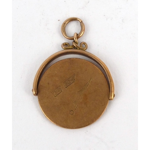 51 - 9ct gold Masonic spinner pendant, 2.5cm high